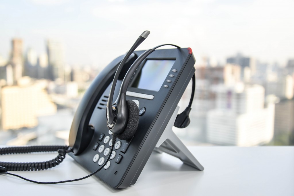 PBX phone with a headset