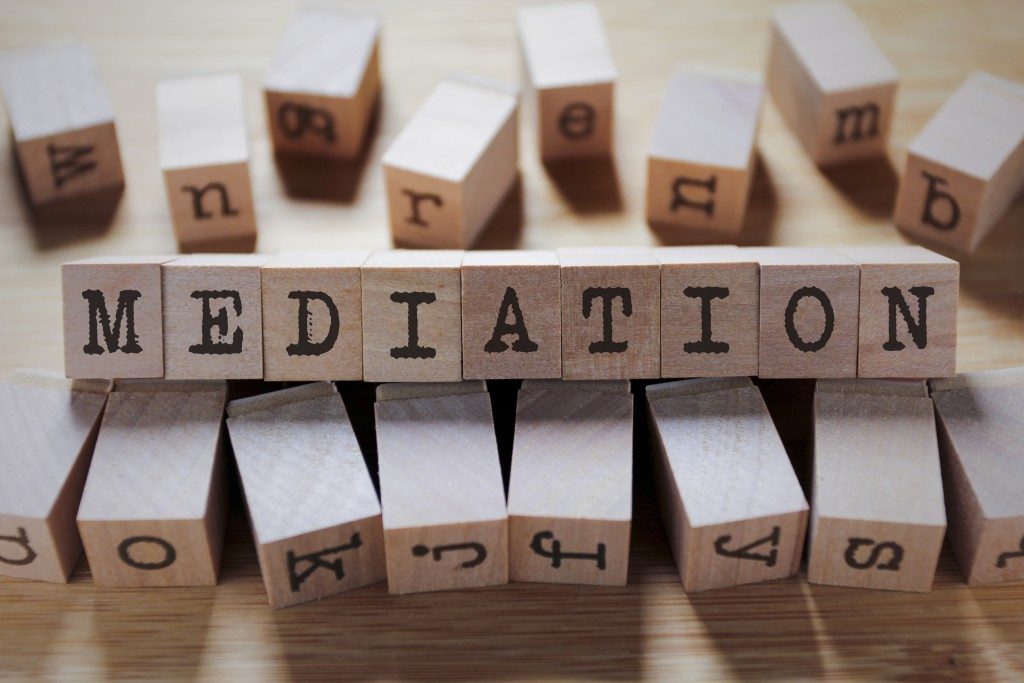 mediation in wooden cubes
