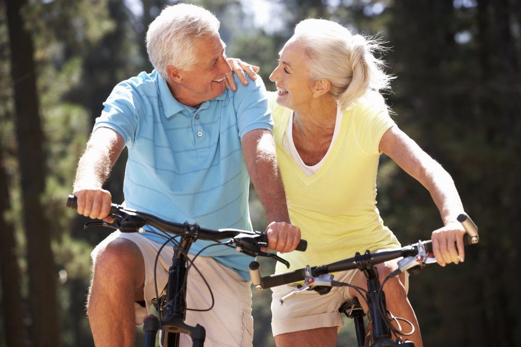 senior couple going on a bike ride